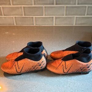 New Balance Kids Orange and Black Sneakers